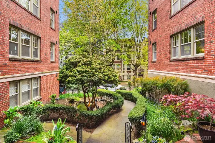 Queen's Court is beautifully landscaped and lovingly cared for.