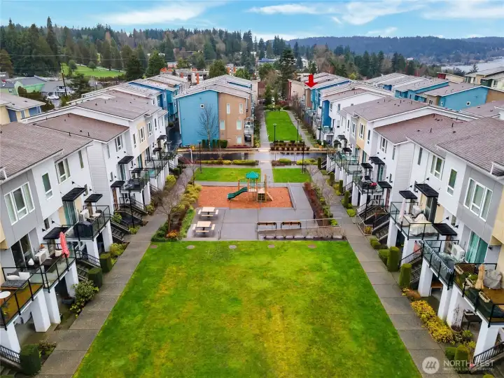 Playground with picnic area steps away from the property