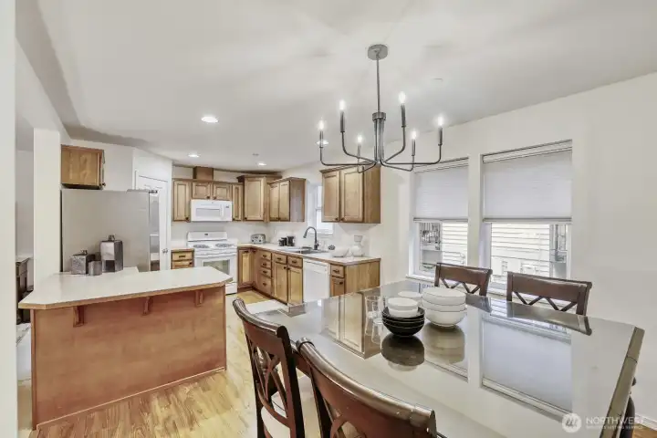 Kitchen with updated lighting, new fridge