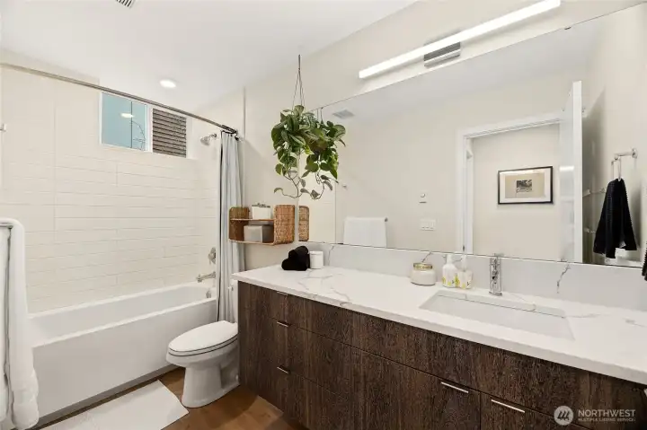 Large full bathroom on first story - next to two bedrooms