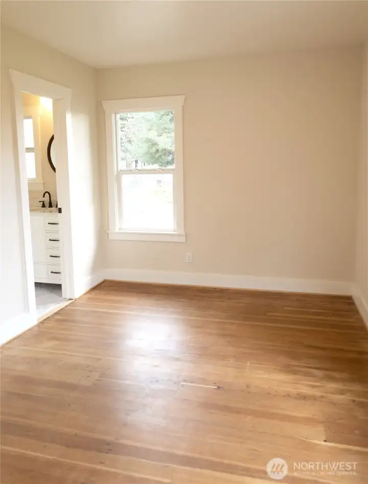 Main level room can be used as an office or additional bedroom.