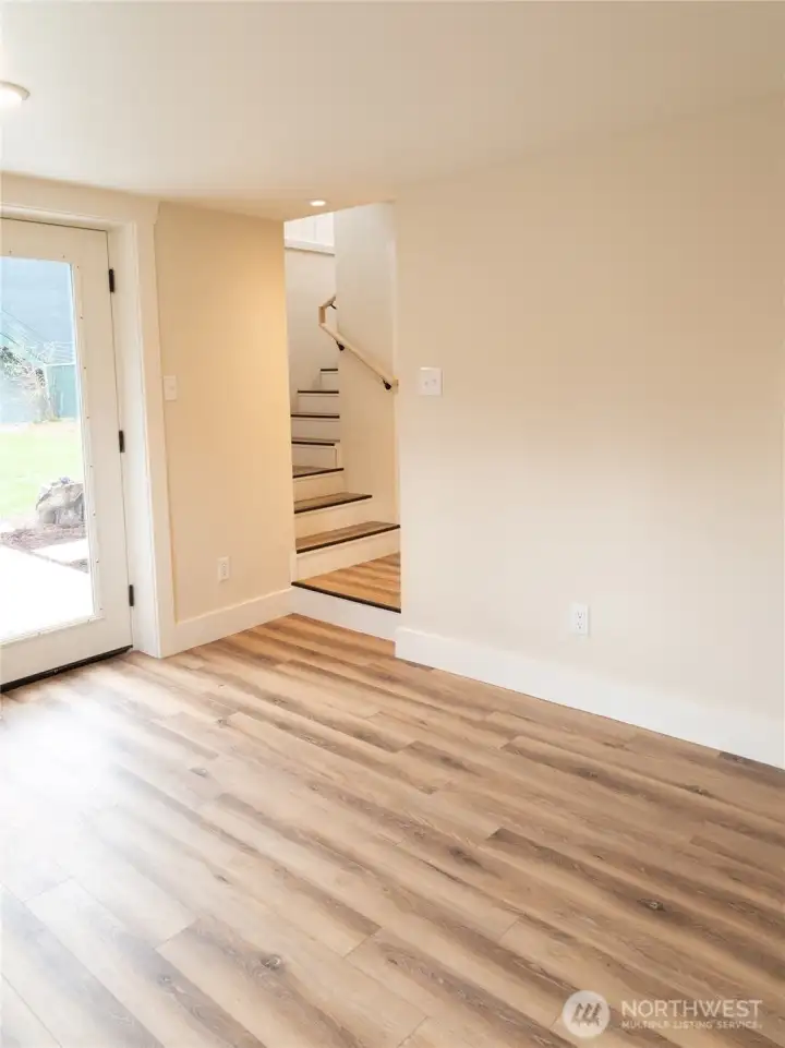 Lower level has a family room, two bedrooms and 2 bathrooms. There is also a brand new stackable washer and dryer located on this level.