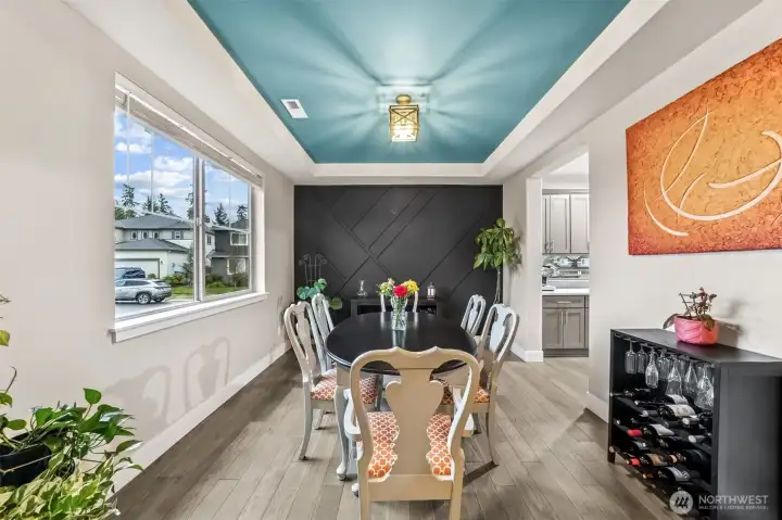 Formal dining room with butler's pantry between dining and kitchen