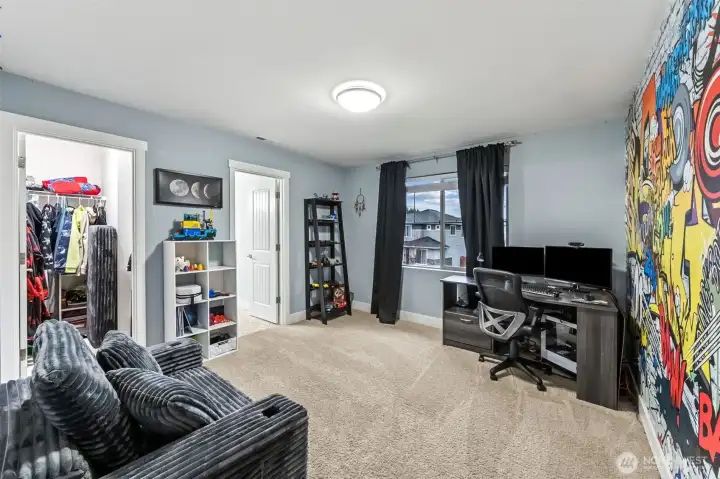 Bedroom 2 with walk in closet and jack and jill bath in view