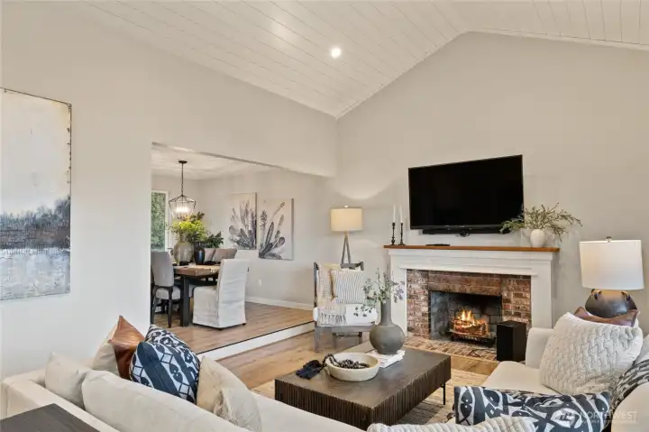 Main level living room with vaulted ceilings