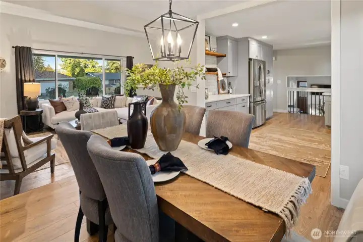 View of dining room, looking out to kitchen and living room.