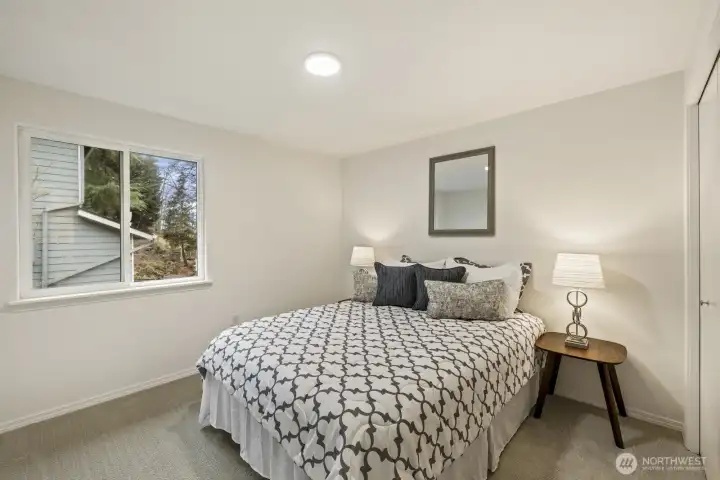 2nd bedroom upstairs easily accommodates a queen size bed.