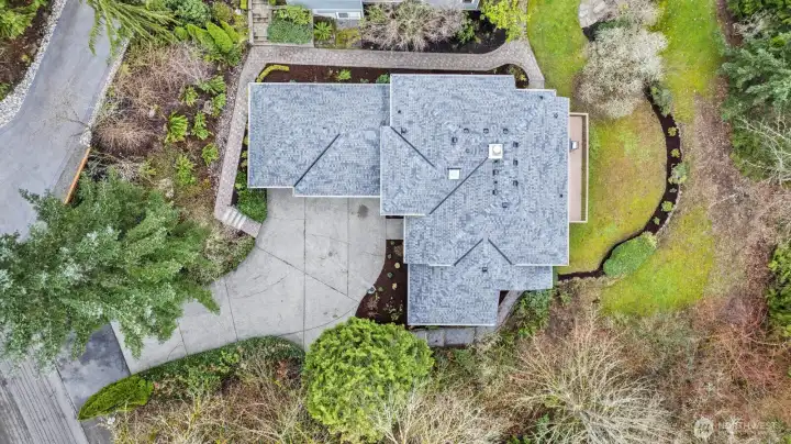 New composition roof. Oversized 3 car garage. Lots of driveway parking. And a peaceful setting.