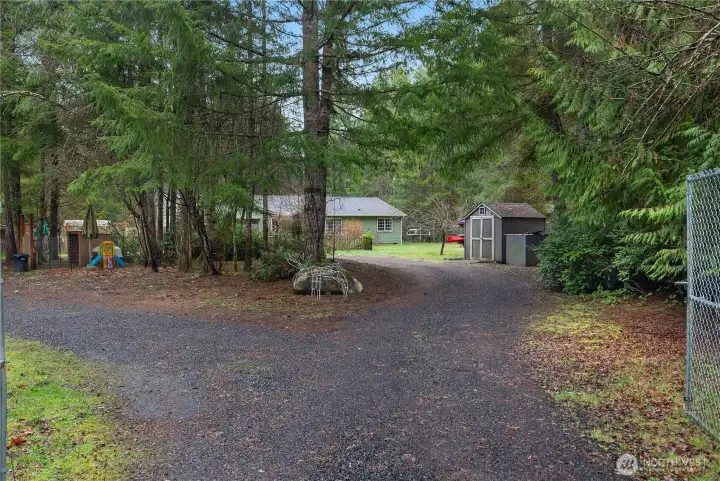 Welcome to this private 3.5 acre fenced and gated property with circular driveway.