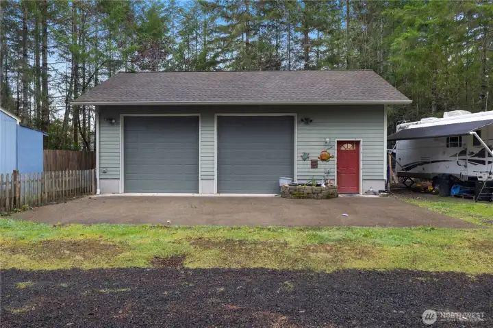 Second RV Spot next to the shop with full hookups and a decorative pond with goldfish.