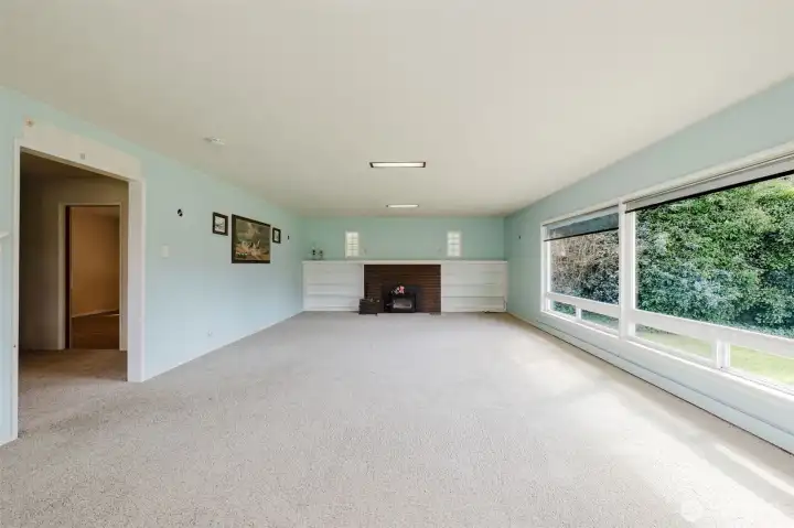 16'  X  30' living room with masonry fireplace and Country insert.