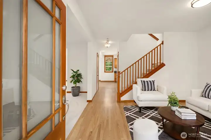 A stunning entry to this incredible home that has been recently updated with new paint and carpet, newer hardwood and tons of charm. This room has been virtually staged. A stunning entry to this incredible home that has been recently updated with new paint and carpet, newer hardwood and tons of charm. This room has been virtually staged.