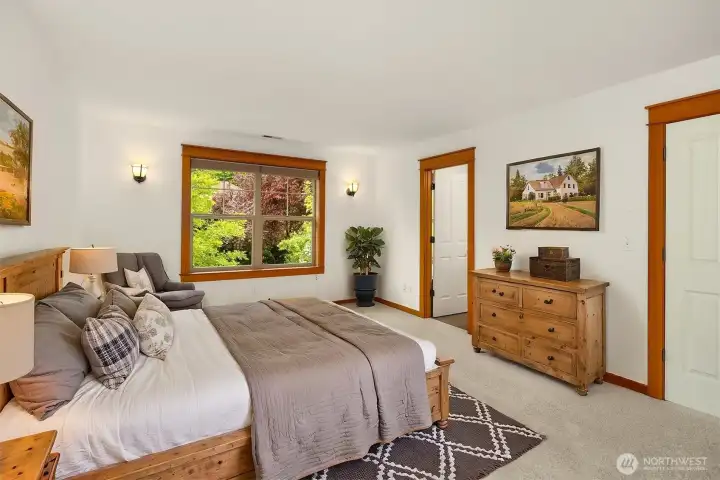 The primary bedroom has been virtually staged to show how expansive the room is. The primary bedroom has been virtually staged to show how expansive the room is.