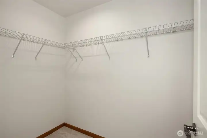The primary bedroom has a large walk in closet. The primary bedroom has a large walk in closet.