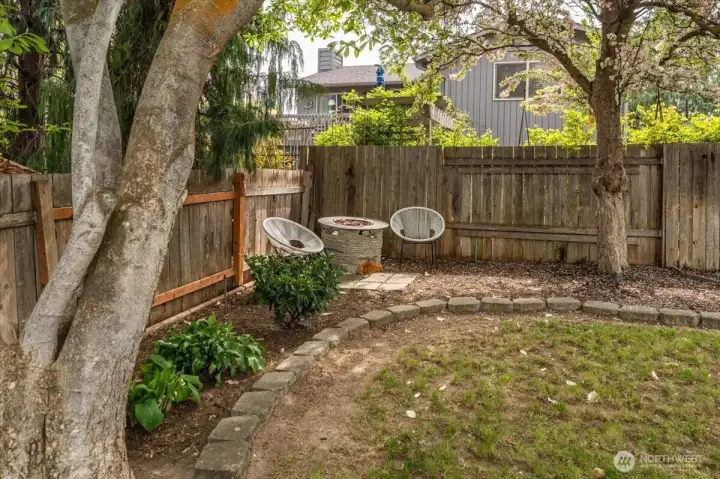 Mature landscaped backyard.