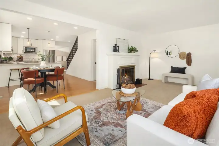 Living room with seamless flow into kitchen.