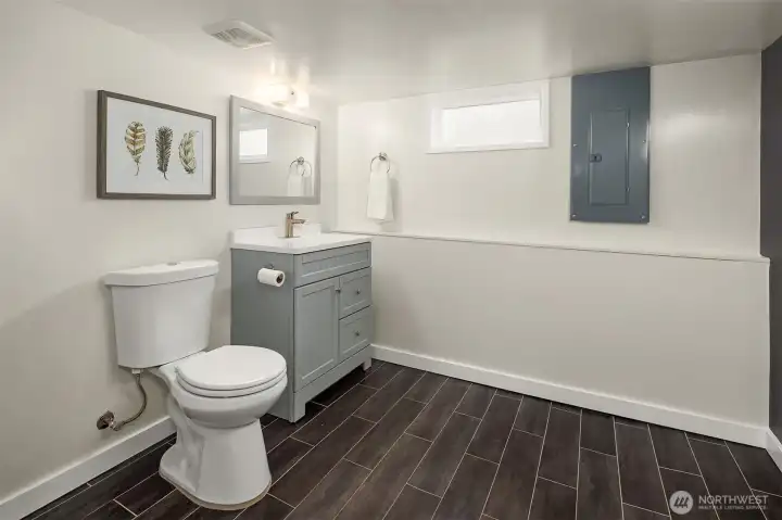 Lower level bathroom with shower.
