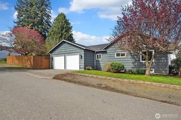 Secured off street parking, driveway parking & two car garage.