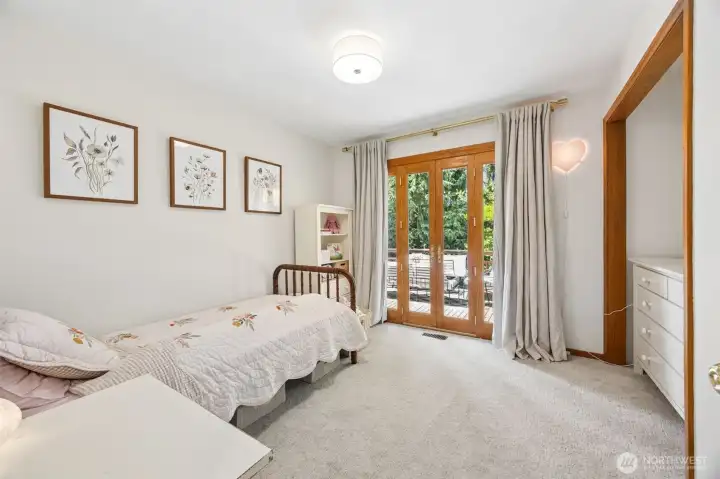 Main level bedroom with french doors