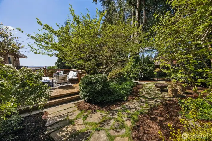 Park-like yard with walking path throughout