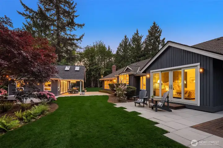Expansive Backyard view of Main Home and Cottage