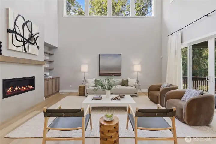 Double tall ceilings in the livingroom make for a grand but inviting living space. Double tall ceilings in the livingroom make for a grand but inviting living space.