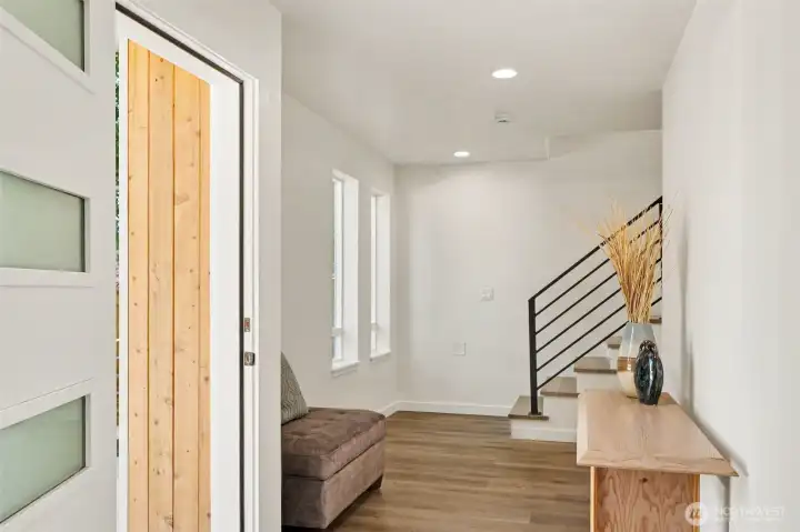 A beautiful front foyer with lots of space to add your personal touch and furniture. Imagine Possibilities, Space for storage closet (not shown in picture) a built-in bench, hanging hooks , you name it. A beautiful front foyer with lots of space to add your personal touch and furniture. Imagine Possibilities, Space for storage closet (not shown in picture) a built-in bench, hanging hooks , you name it.