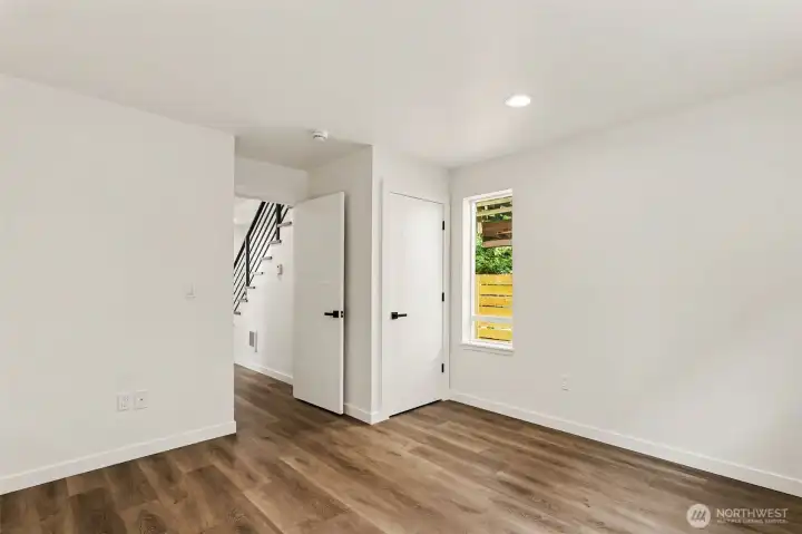Spacious downstairs guest bedroom creates an ideal setup for guests, home office, or multi-generational living. Spacious downstairs guest bedroom creates an ideal setup for guests, home office, or multi-generational living.