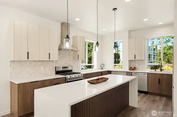 Kitchens is complete with huge island, stainless steel appliances included built in microwave, quartz countertops, stone backsplashes, full range hood, high quality fixtures. Kitchens is complete with huge island, stainless steel appliances included built in microwave, quartz countertops, stone backsplashes, full range hood, high quality fixtures.