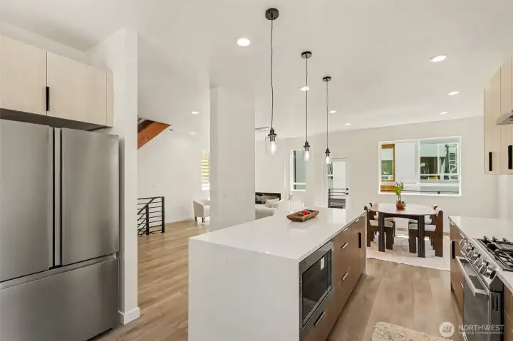 Kitchens is complete with huge island, stainless steel appliances included built in microwave, quartz countertops, stone backsplashes, full range hood, high quality fixtures. Kitchens is complete with huge island, stainless steel appliances included built in microwave, quartz countertops, stone backsplashes, full range hood, high quality fixtures.