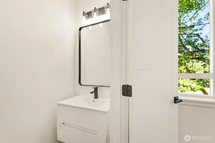 Powder room located in same floor as kitchen, dining and living room. Powder room located in same floor as kitchen, dining and living room.