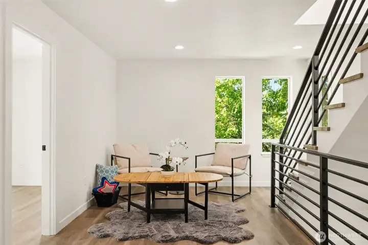 Cozy family room. the door on left is to the second guest room. Cozy family room. the door on left is to the second guest room.