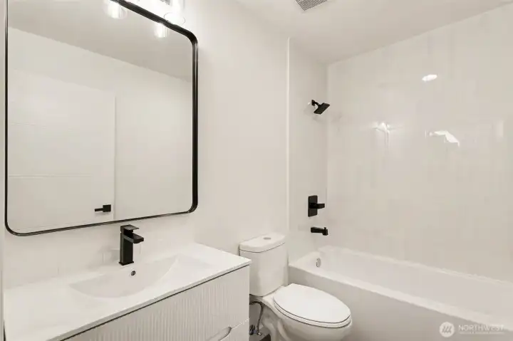 Upstairs full guest bathroom. Upstairs full guest bathroom.