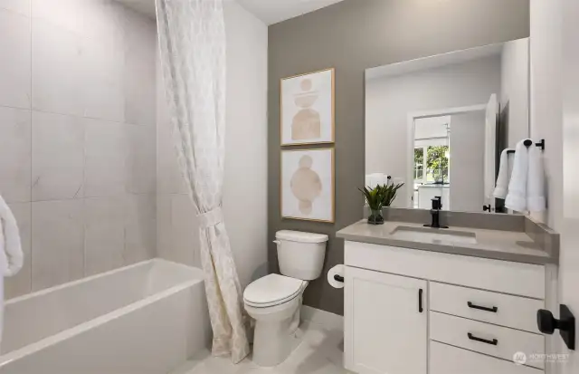 Secondary bathroom. All pictures are of our staged model. Finishes will vary