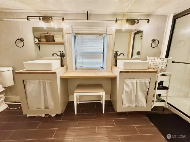 Primary Bathroom with double sinks and vanity