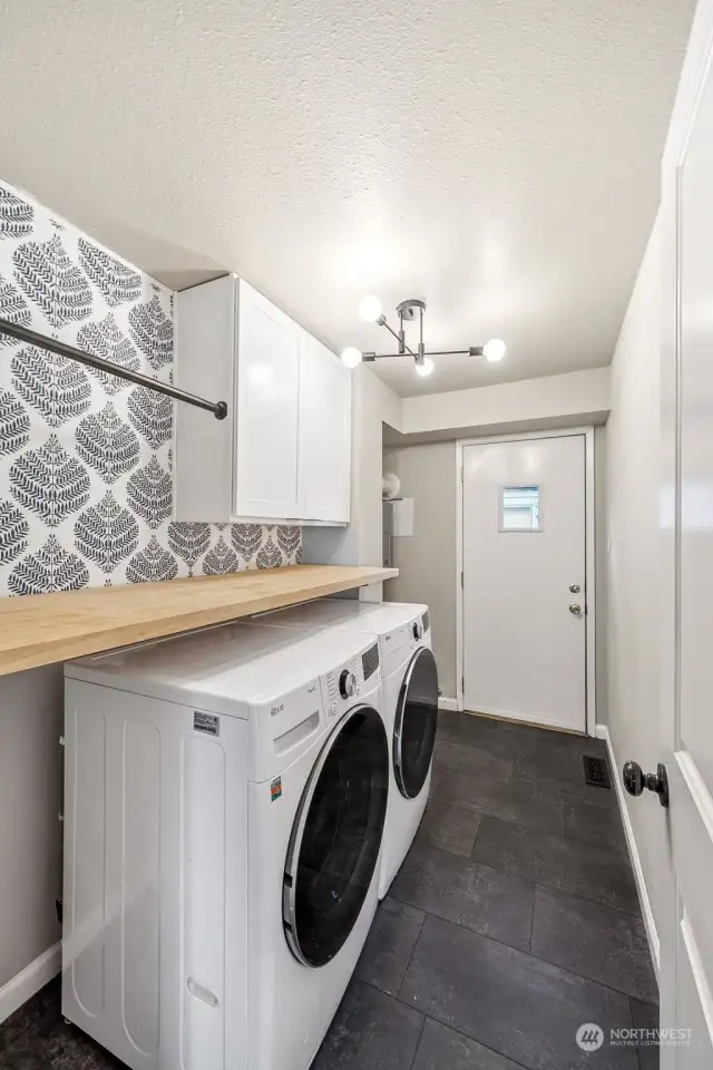 Laundry room with front loader washer and dryer included with sale!