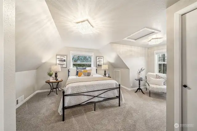 Upstairs primary bathroom, featuring 2 closets.