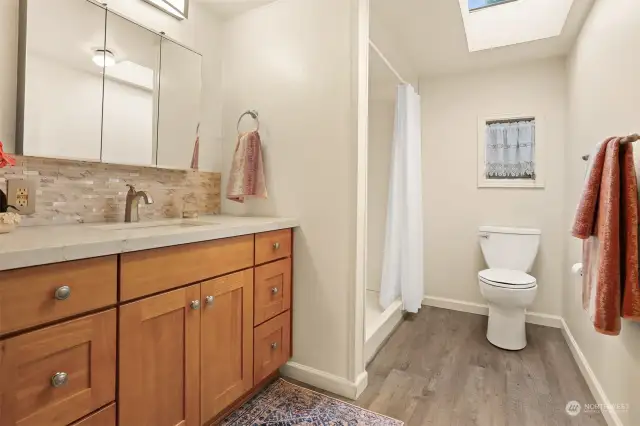 Master bedroom suite with dual closets and a remodeled bathroom.