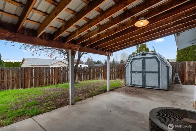 Huge Covered Patio Runs Length of West Side of Home
