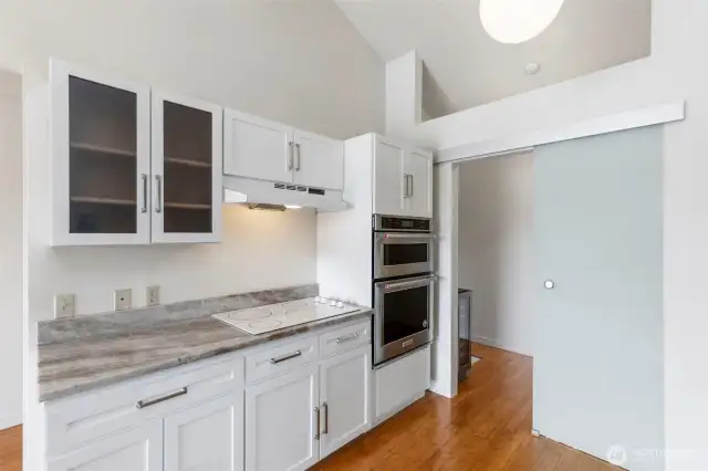 Large walk-in pantry with wine-cooler.