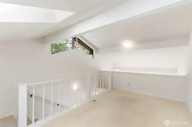 Spacious loft area can be used in a variety of ways.