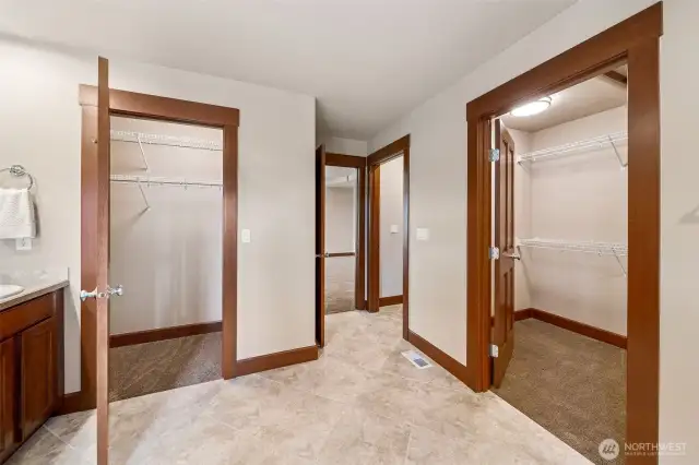 The "His & Her" walk-in closets are both spacious!