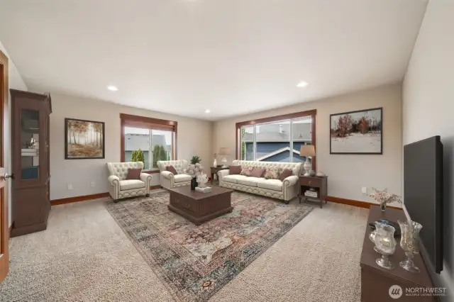 The extra large Bonus Room provides a very flexible space ... (Virtually staged).