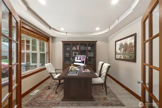 The double french doors lead to the spacious Study, overlooking the front of the Home. (Virtual staging).