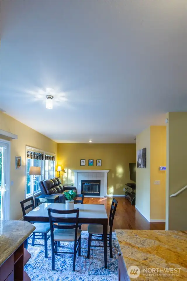 The kitchen is open to the casual eating space, which also flows to the family room beyond.  The chef won't miss out on the activity in the family room while preparing meals.