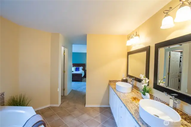 Another view looking from the primary ensuite bathroom through to the bedroom.