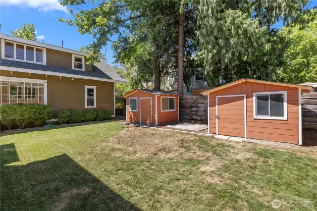 2 sheds in fenced backyard