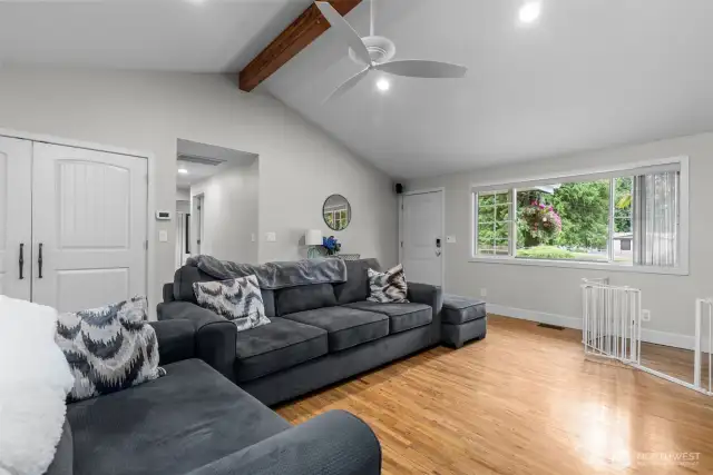 Open living with hardwood floors,