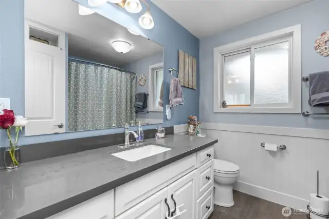 Updated bathroom with high end finishes and radiant heated tile flooring
