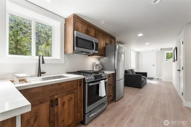 Gas Range and LVP Flooring throughout